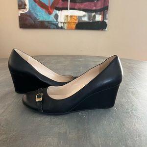 Cole Han Grand OS black leather wedge heels with gold buckles